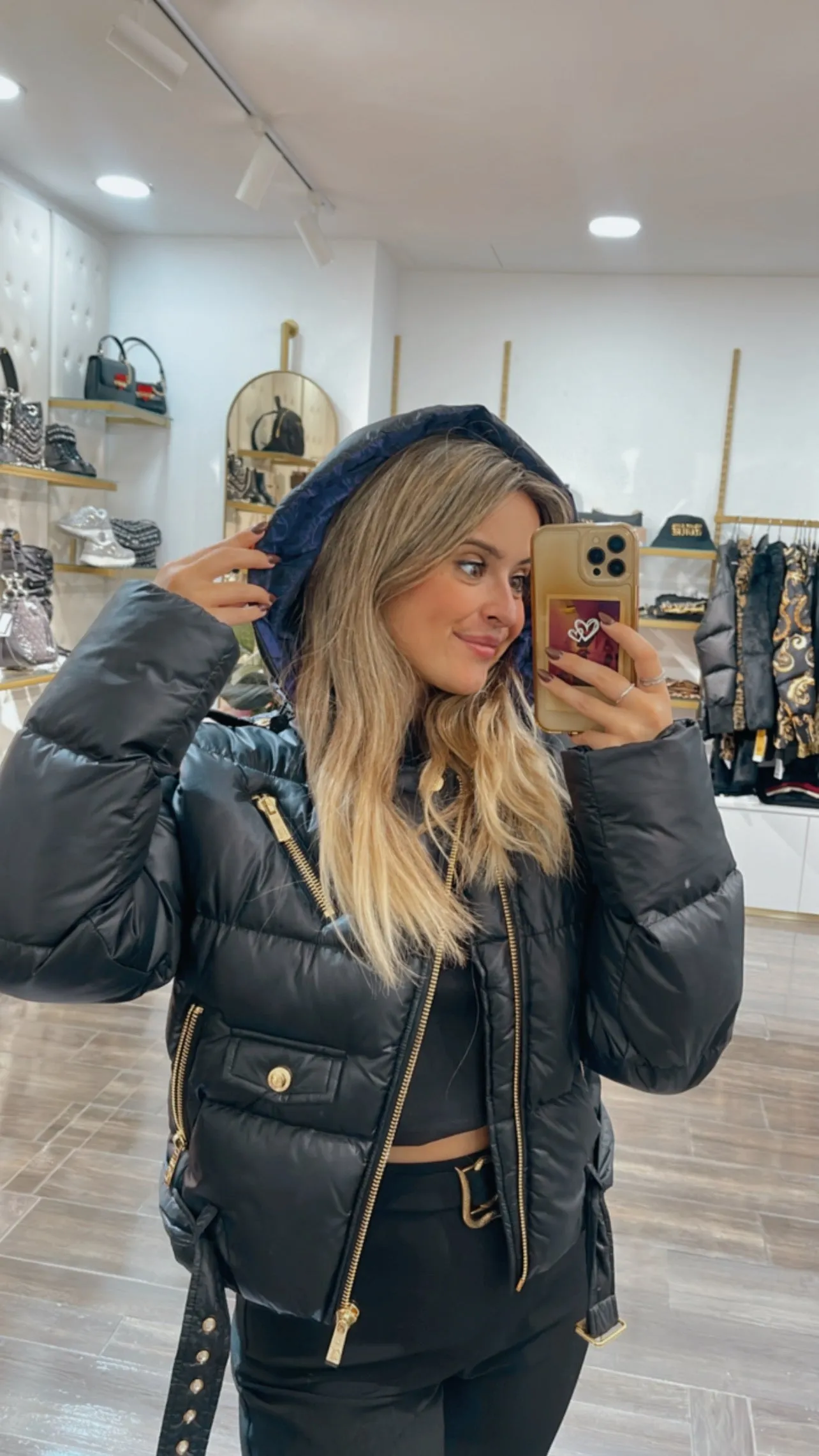 Black puffer jacket with purplw detail